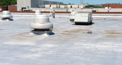 rooftop with air conditioner and vent.